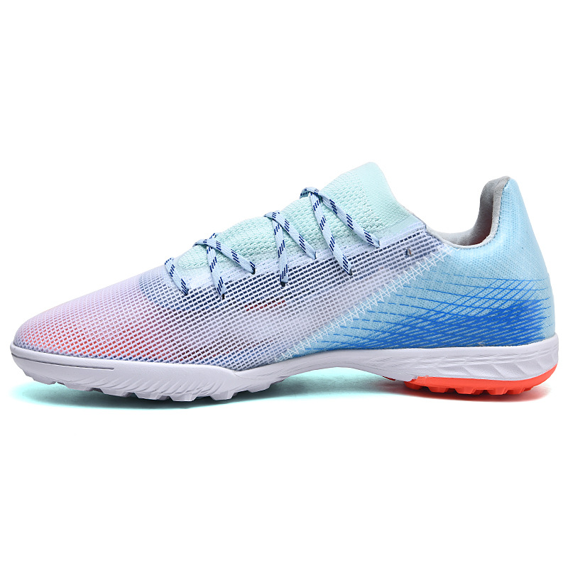 Transfronterizo nuevos zapatos de fútbol hombres y mujeres antideslizante cómodo más tamaño deportes bajo-top roto uñas de hierba zapatos de fútbol