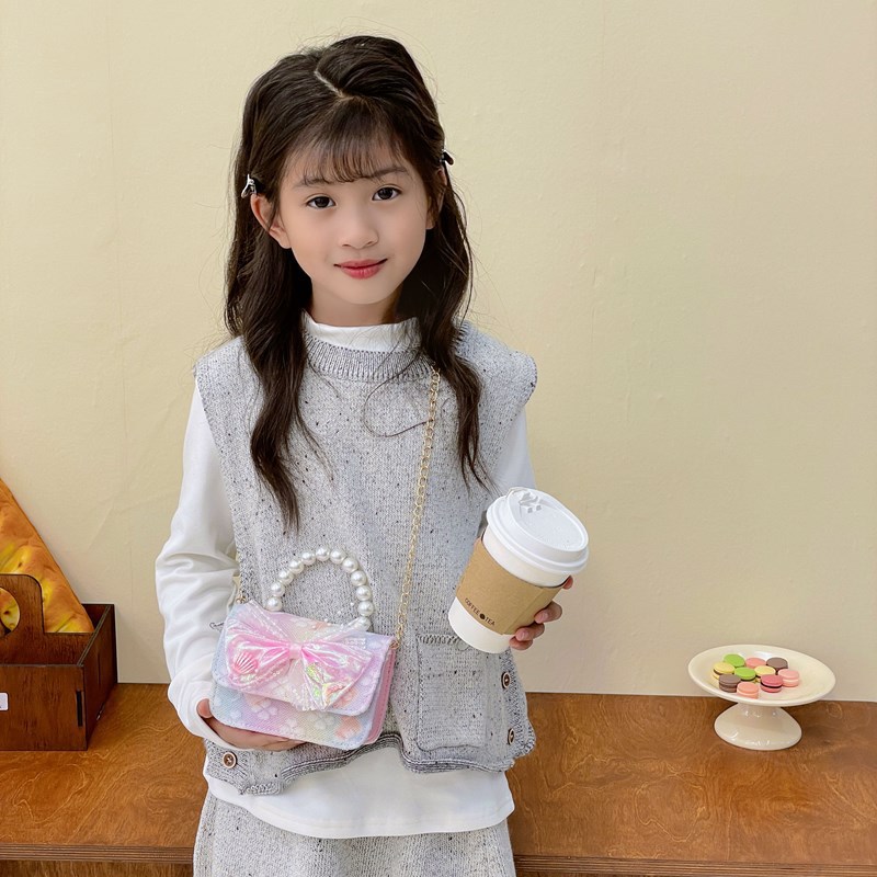 Nuevo bolso para niños niña arco de perla de hombro bolso de mano princesa de estilo extranjero mini bolso de cambio