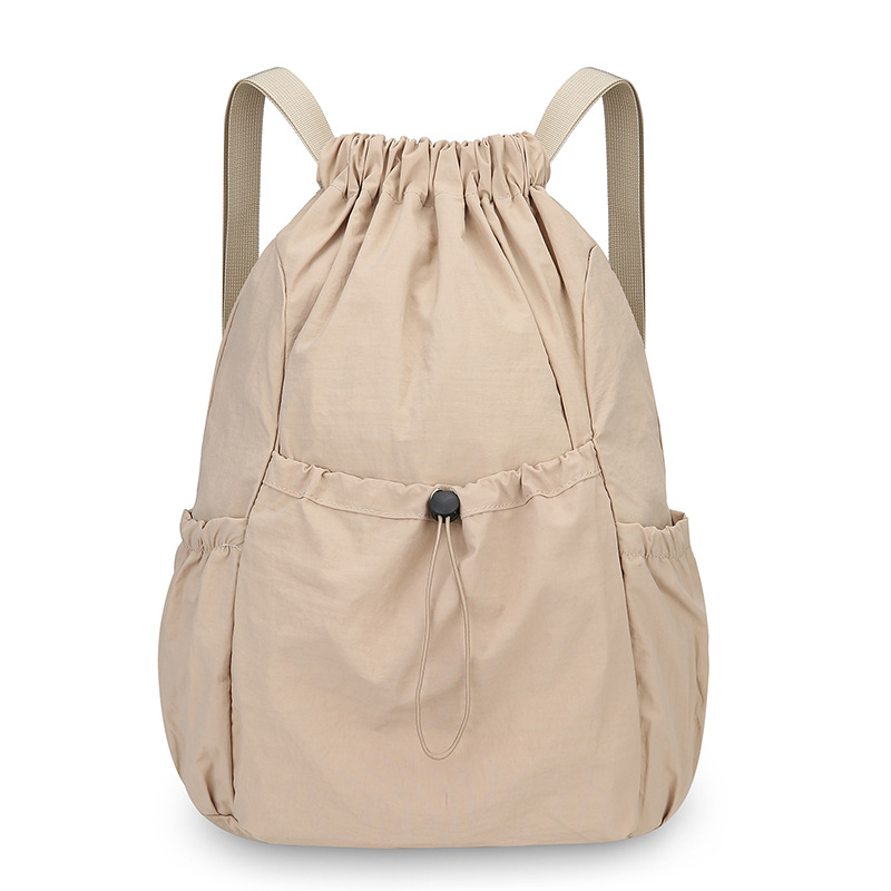 Mochila de cuerda ligera comercio exterior mochila al aire libre coreana de gran capacidad de mujeres viajes viajeros ociosos bolsa al por mayor