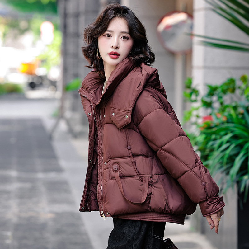 Algodón de mujer coreana encapuchada corta 2025 invierno nuevo hombre pequeño suelto grueso abrigo cálido temperamento de algodón