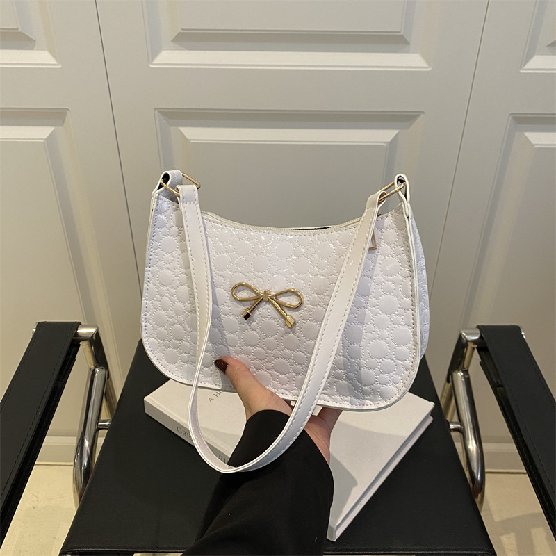 Estilo caliente de primavera y verano, diseño de moda, todo fósforo, casual, bolso de viaje diario, bolso de axila de hombro nuevo para mujer 2025