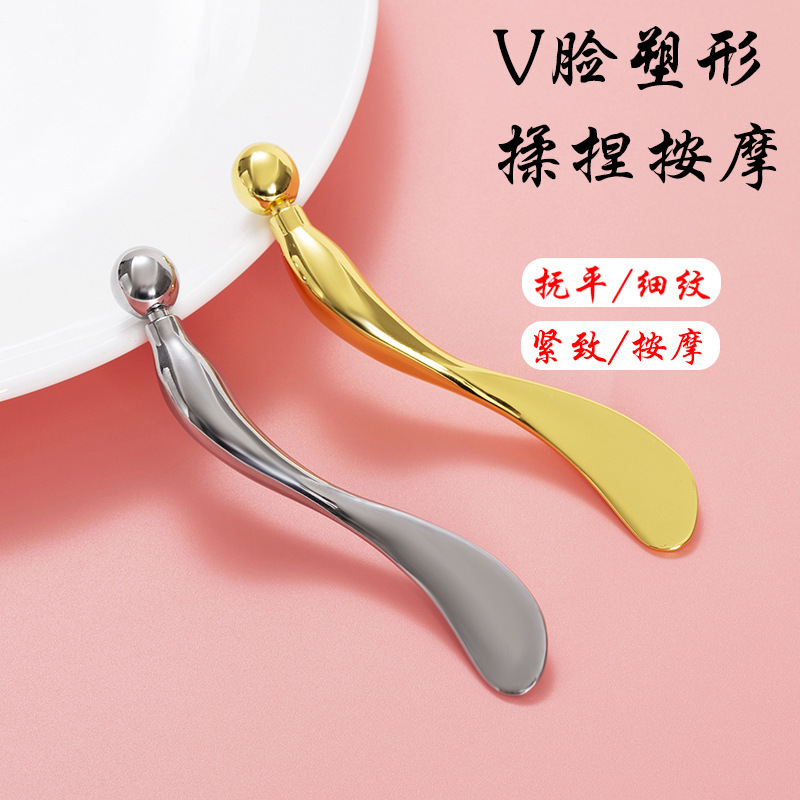 Eye massage applicator with metal ball to relieve eye fatigue, spoon-shaped applicator for applying cream, home facial skincare tool