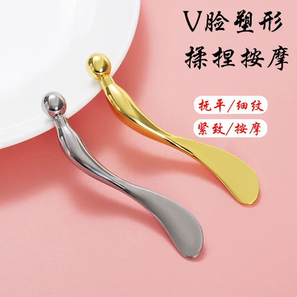 Eye massage applicator with metal ball to relieve eye fatigue, spoon-shaped applicator for applying cream, home facial skincare tool