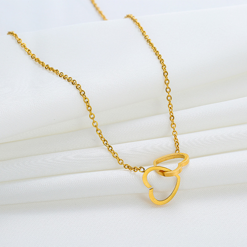 Collana con doppio cuore in acciaio inox elegante da donna_voghion.com