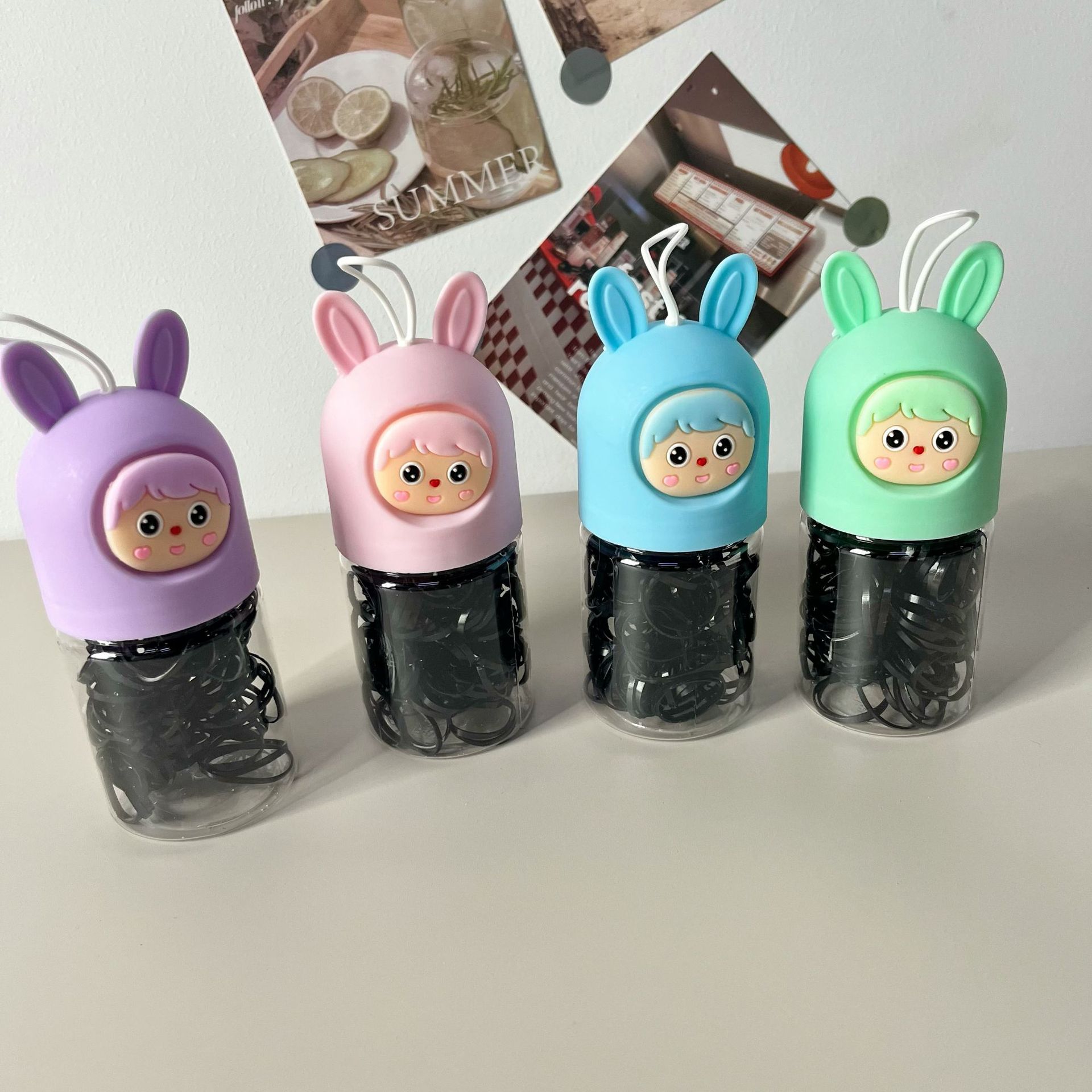 Yiwu al por mayor dibujos animados enlatados cabeza de cuerda de goma desechable negro colorido para niños no lastimar anillo de pelo cinta de goma encantadora
