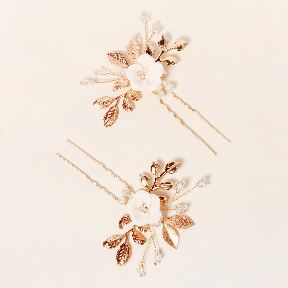 New Bridal Ornament Golden Leaf Pearl U-shaped Pin Ancient Style Han Chinese Clothing Updo Hair Accessories Ceramic Flower Hairpin display picture 5