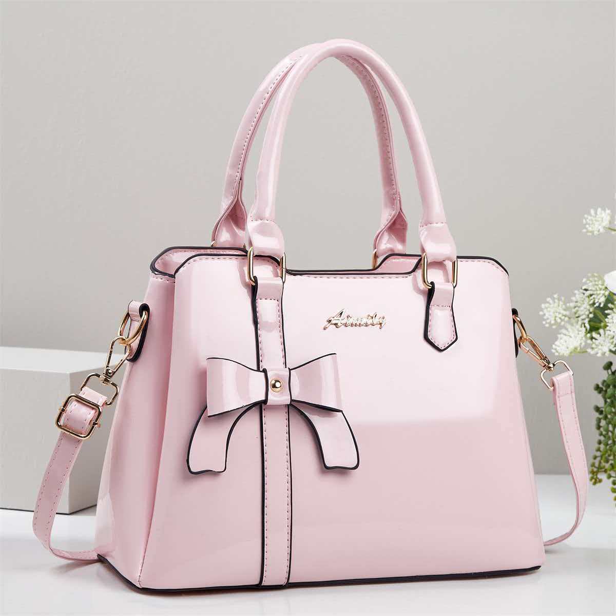 Bolso de mano de arco de piel brillante, bolso de hombro casual de moda, bolso de madre, temperamento, bolso de mochila transfronterizo
