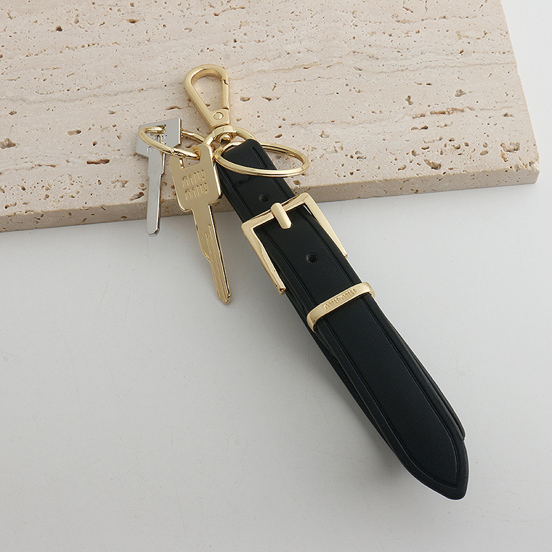 Xiaohongshu ins estilo explosivo uim caja de llaves de cuero colgante llavero de coche colgante pequeño de moda para hombres y mujeres