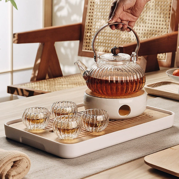 Transparent pumpkin pot + 4 pumpkin cups + round tea warming stove + tea tray