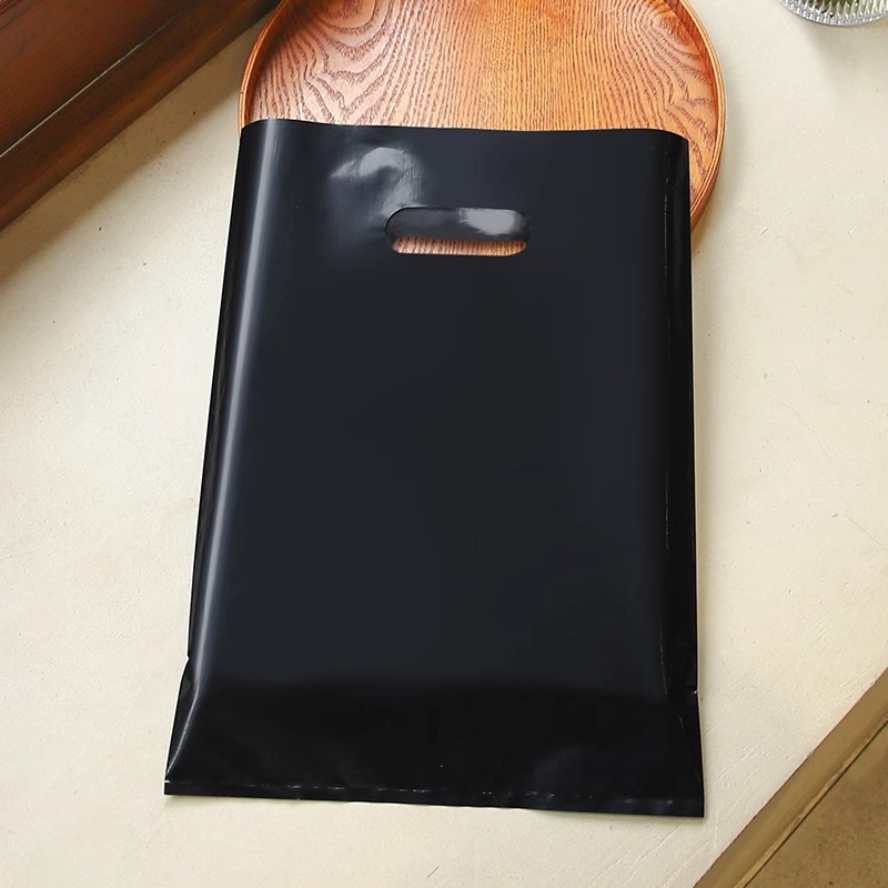 Bolsa de mano de tienda de ropa de grosor, bolsa de embalaje de ropa para niños y niñas, bolsa de almacenamiento de cosméticos, bolsa de regalo, bolsa de embalaje comercial
