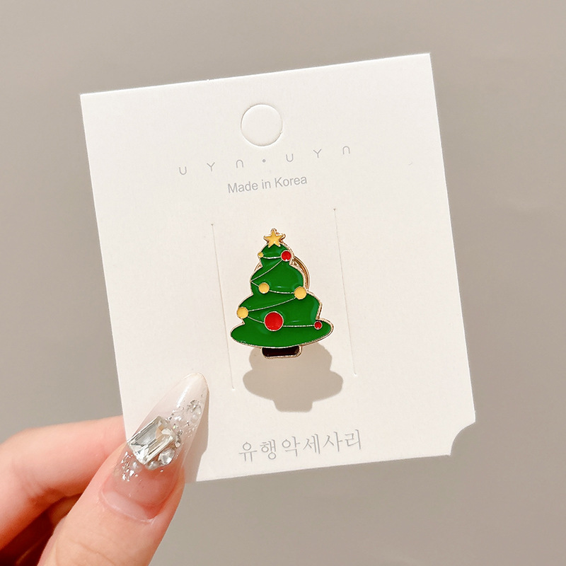 Broche de aleación de sentido avanzado japonés nueva insignia de personalidad de moda femenina de dibujos animados bolsa de Navidad accesorios de metal al por mayor