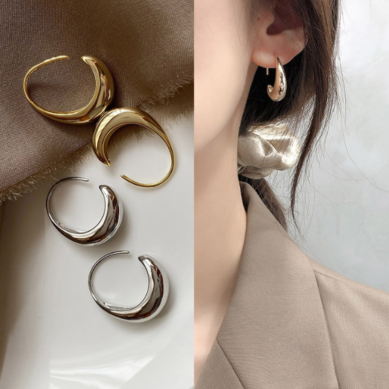 Europa y los Estados Unidos irregulares pendientes en forma de C instiles estilo de moda simple pernos de orejas femeninos versátiles de alta calidad ligeros pernos de orejas de lujo