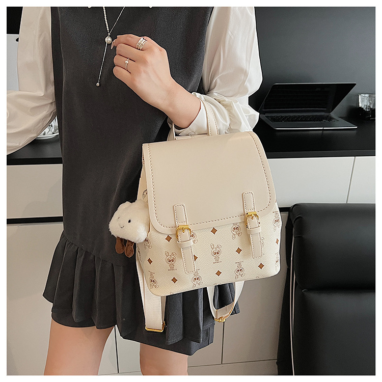 This is a niche design for women, featuring cartoon animal prints. It is a pink backpack with a high level of appearance and large capacity for travel undefined