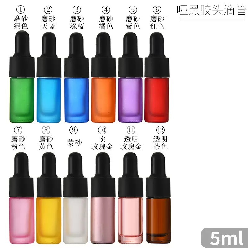Venta al por mayor de 10ml botella de bolas de vidrio de colores botella de bolas mate y protegida de la luz botella de spray de perfume de 5ml botella de aceite esencial