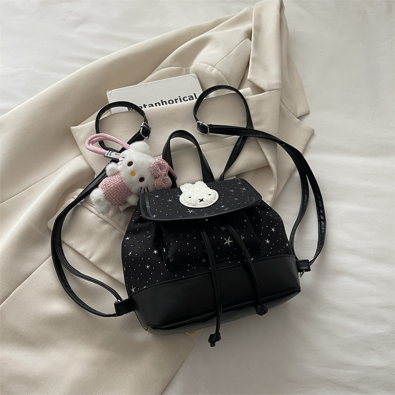 Mochila de moda coreana encantadora nicho femenino diario dulce estrella ondulado punto mochila de estudiantes mochila universal