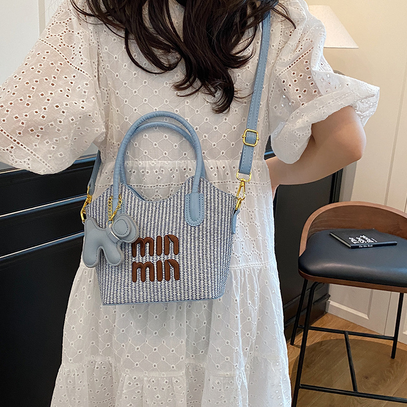 2025新款草编单肩包女今年流行手提包包女潮流水桶斜挎包小众设计|undefined