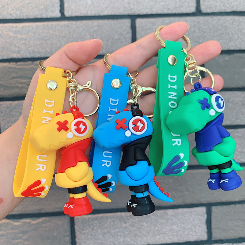 Dinosauro llavero música rayo pequeño dinosaurio muñeca de silicona bolso llavero de automóvil colgante moda regalos frescos