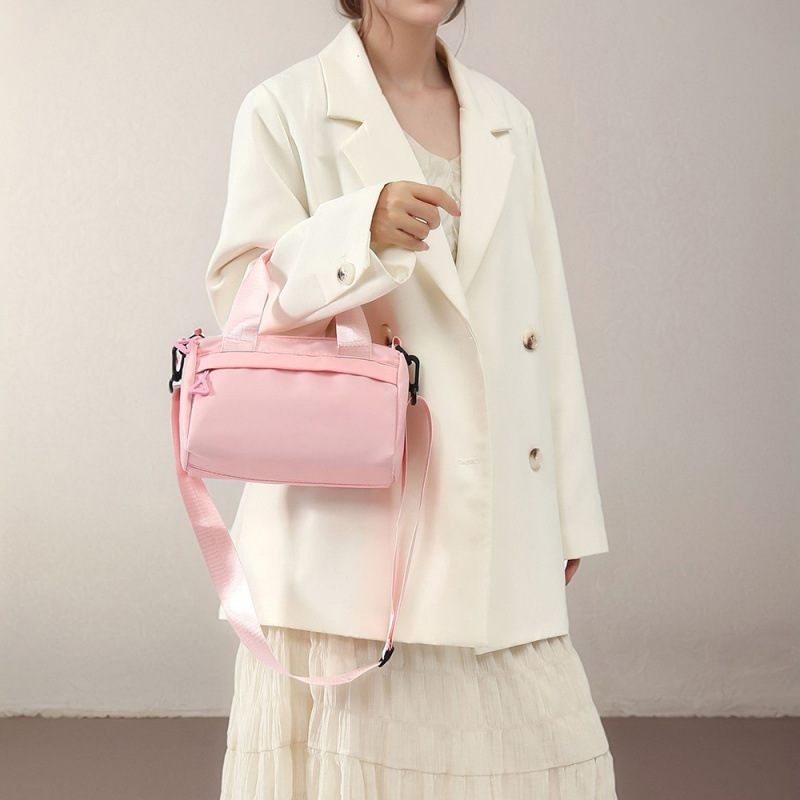 Bolso de mujer japonés simple bolso de hombro de mujer casual de gran capacidad bolso de mano deportivo versátil bolso de viento deportivo