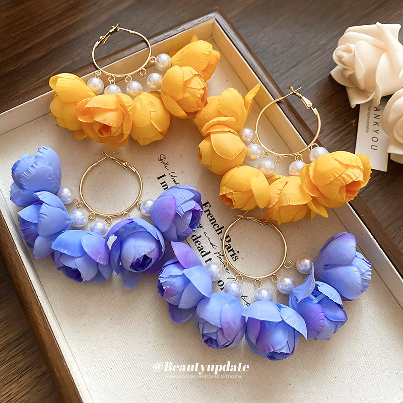 Pendientes de borla de flor de tela de aguja de plata Pendientes de estilo bohemio súper hada femenina Pendientes de moda femenina