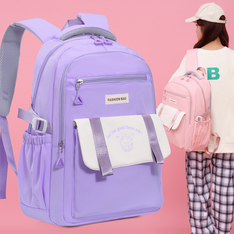 Fábrica al por mayor estudiante de secundaria schoolbag simple moda de gran capacidad impermeable reducción de carga mochila de viaje