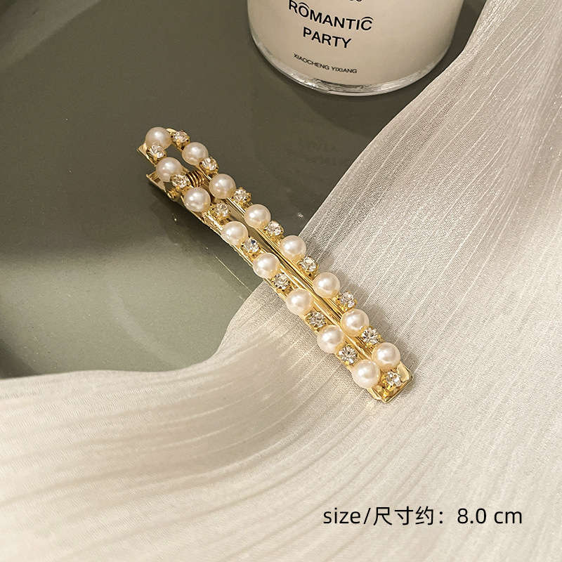 Corea del Sur clip para el cabello de perlas en línea clip para el cabello de mujeres rasgadas clip para el cabello de una palabra clip para el cabello de bordes fría BB clip lateral clip para el temperamento clip para la cabeza