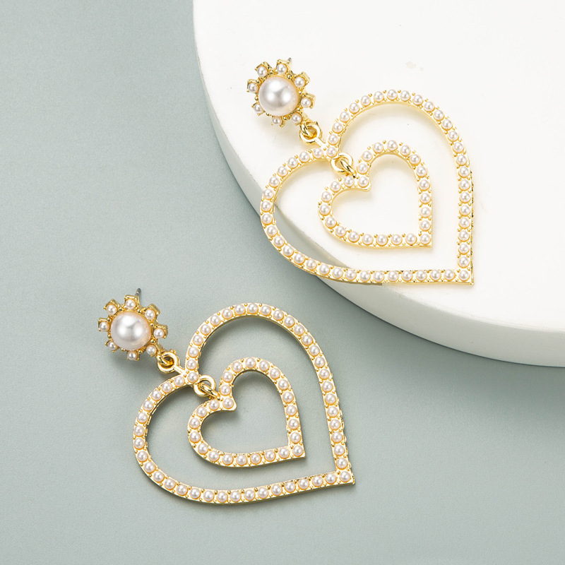 Creative Hollow Double Heart-shaped Earrings display picture 5