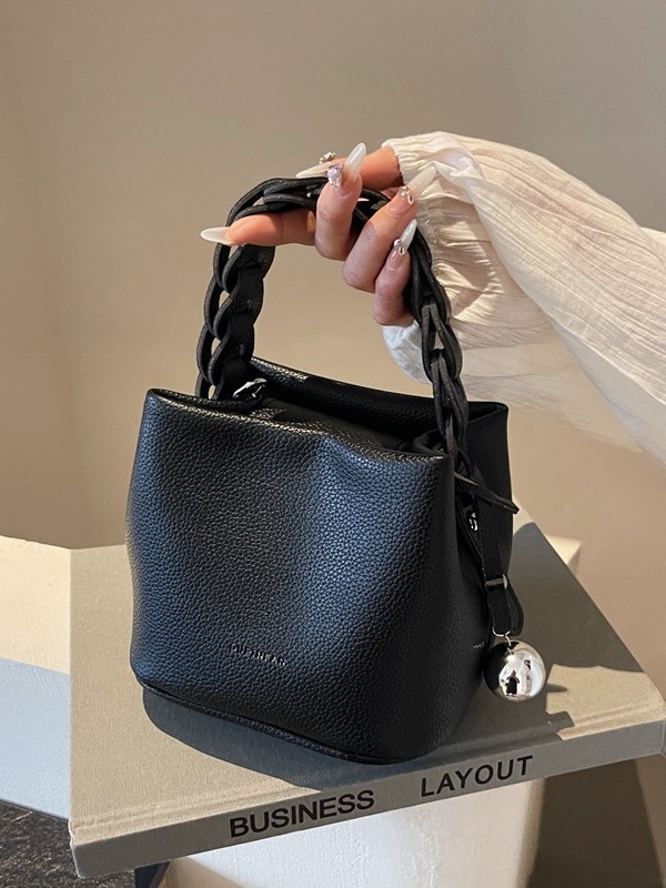 Bolso de mujer 2026 verano nuevo tejido a mano bolso de cubo de moda simple bolso de hombro mochila