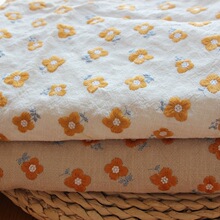 棉麻绣花布料小黄花服装布料日式重工刺绣布