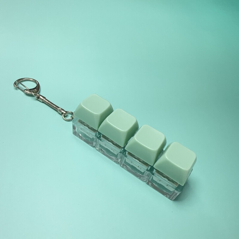 クロスボーダー一字型四ボタンは純色のボタンを押して軸を解凍します。|undefined
