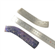 Hand forged Damascus steel with blue and pickled mosaic patt