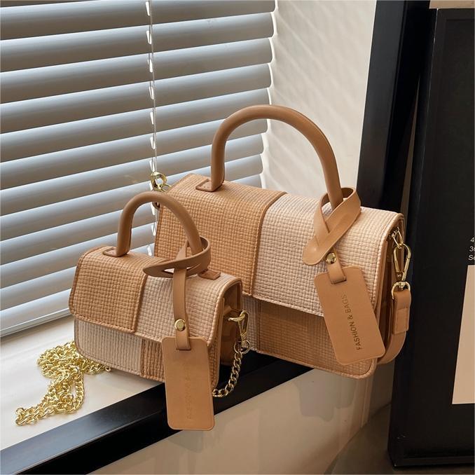 Bolso de mano coreano de contraste de color para mujeres 2024 primavera y verano nuevo bolso de moda universal bolso pequeño de nicho textura mochila