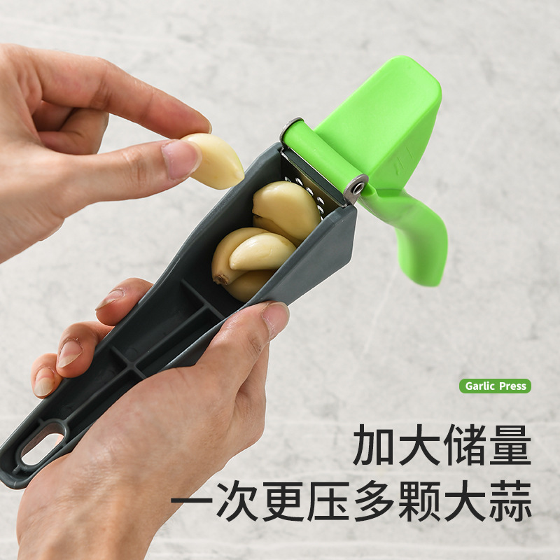Cross-border Amazon kitchen gadget manual garlic press household mashed potatoes garlic press stainless steel garlic press