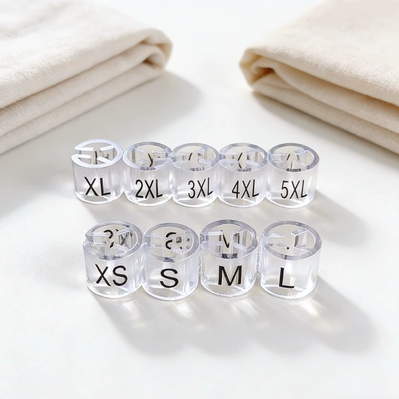Прозрачные пластиковые кольца-маркеры размеров SMLXL для одежды и брюк, в наличии, от производителя.