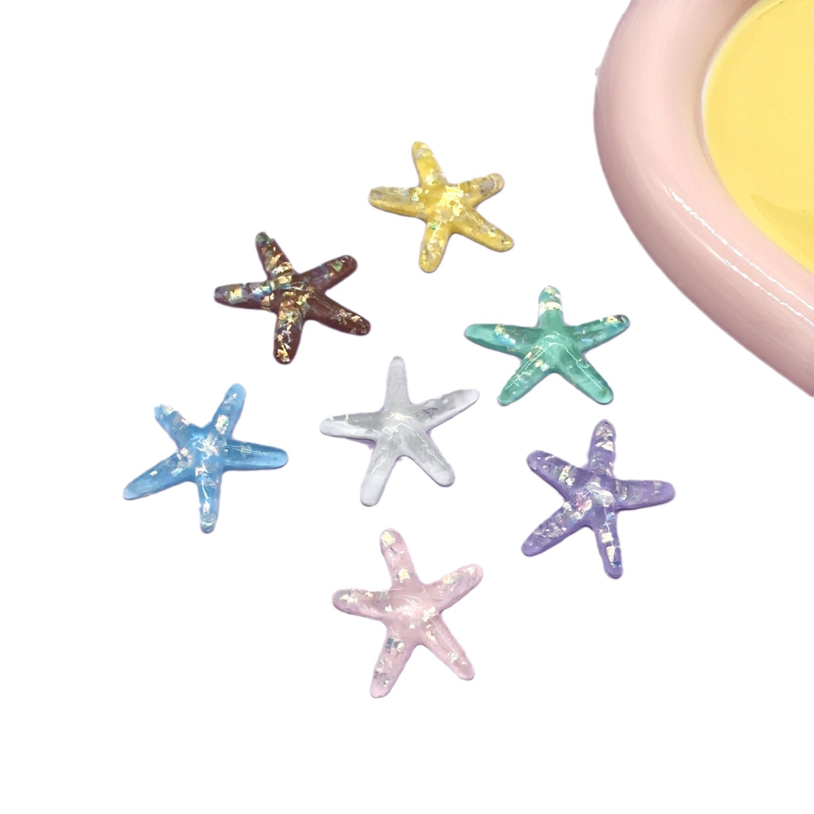 Sequinilla de resina gelatina accesorios de estrellas de mar agujero zapatos DIY pegamento de crema DIY material hecho a mano BB clip al por mayor