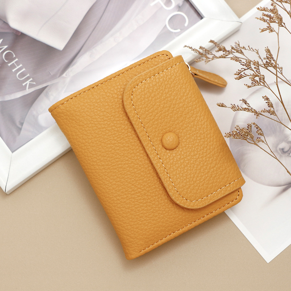 Nuevo cross-border cremallera bolso de cambio nicho creativo multifuncional bolso de tarjetas de moda litchi patrón corto para mujeres