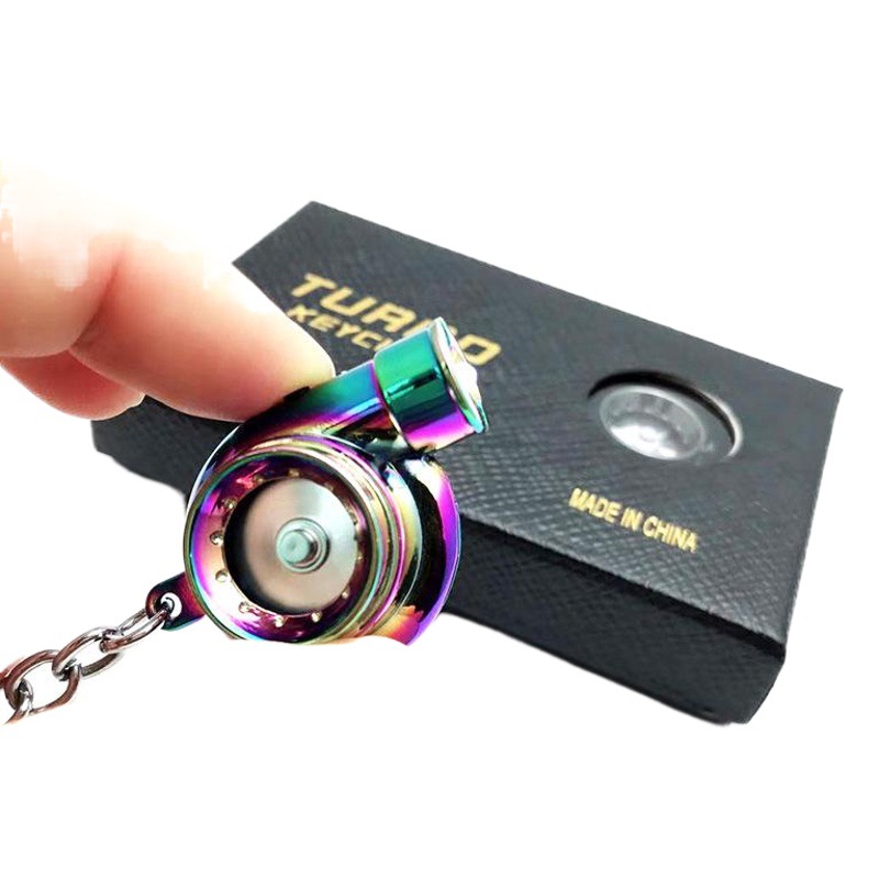 Transfronterizo caliente coche turbina llavero metal creativo de alta gama luminoso LED turbina coche llavero colgante