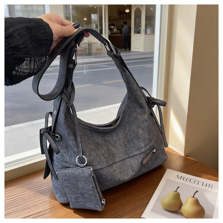 Bolso coreano de gran capacidad para mujeres 2026 verano nuevo viaje transfronterizo tote bag retro nicho mochila de hombro