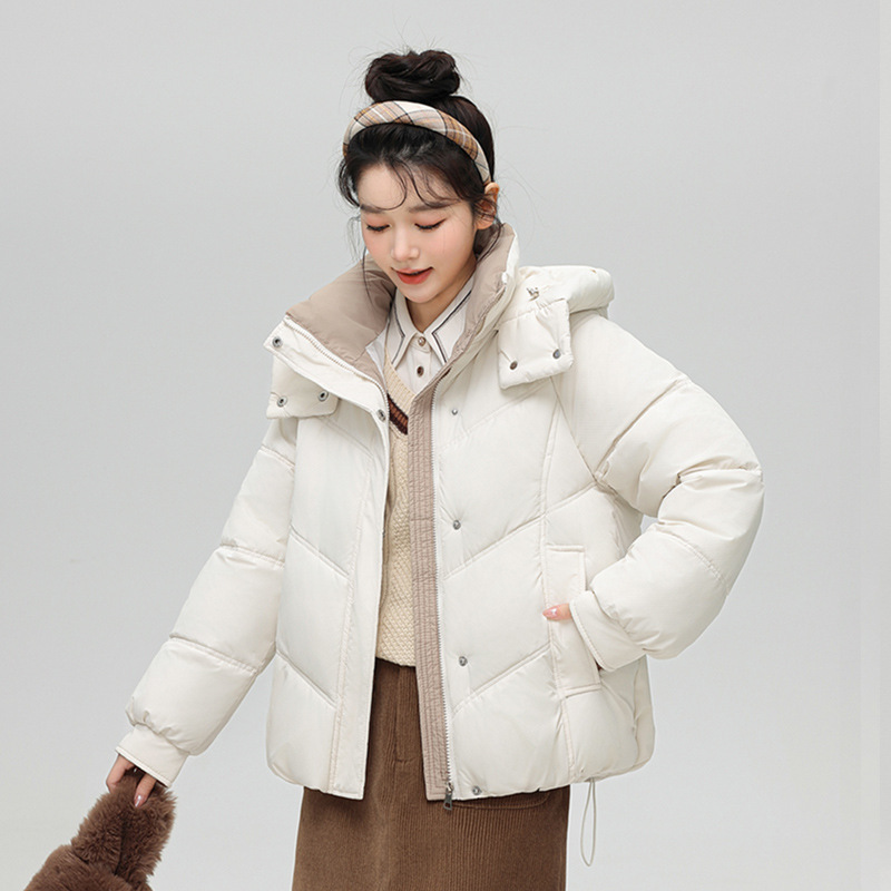 Algodón mujer 2025 otoño y invierno nuevo estilo coreano corto engrosado plumón chaqueta de algodón pequeño suelto chaqueta con capuzas de color contraste