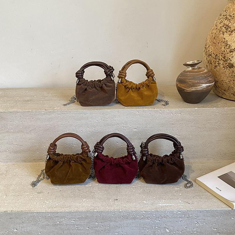 2025 nuevo bolso infantil coreano, mini bolso de ropa de bebé, bolso de hombro para hombres y mujeres, cadena de moda