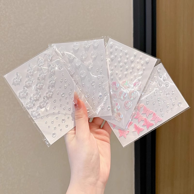 Esquina de los ojos de los niños maquillaje pegatinas joyas faciales taladro pegatinas de diamantes pegatinas de perlas mariposa escenario maquillaje espectáculo calcomanías