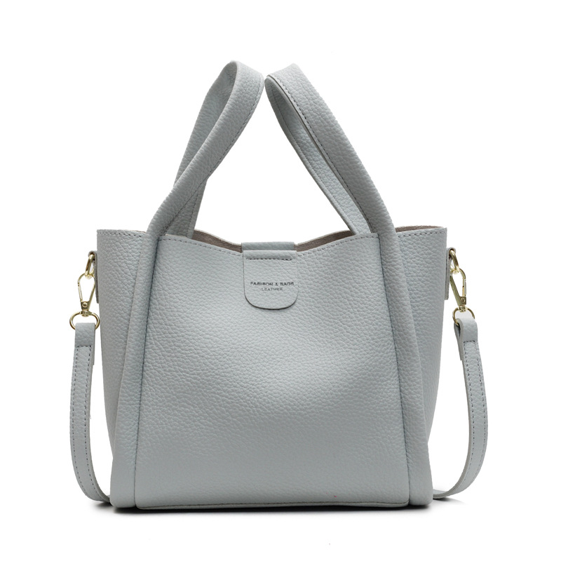 Comercio exterior ocio retro bolso de cubo de mano 2025 nuevo versátil simple bolso de hombro de alta calidad textura mochila