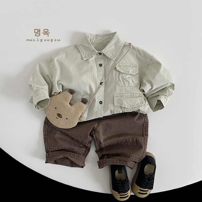 Camisas infantiles de viento de trabajo 2025 ropa de primavera nueva chaqueta de viento al aire libre de niñas ropa infantil japonesa coreana al por mayor