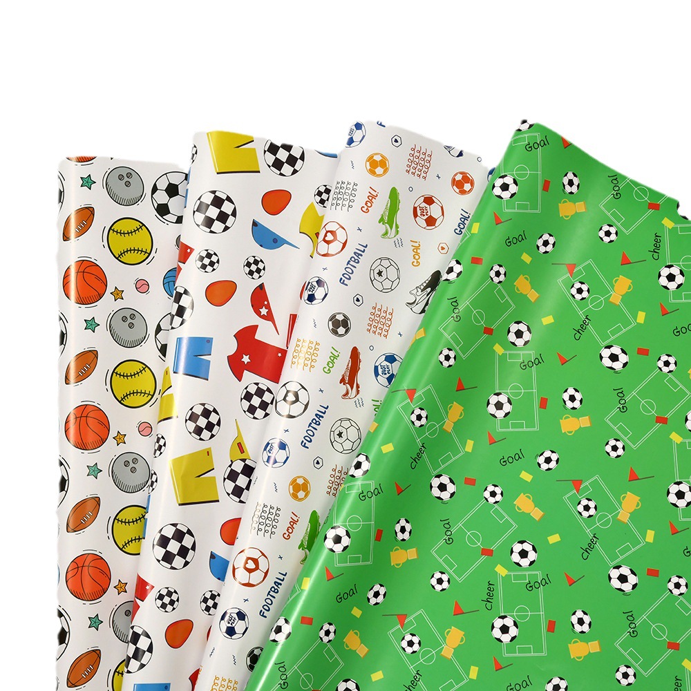 Nuevo papel de regalo de dibujos animados transfronterizo al por mayor Papel de embalaje de baloncesto de fútbol del Día de los niños en stock