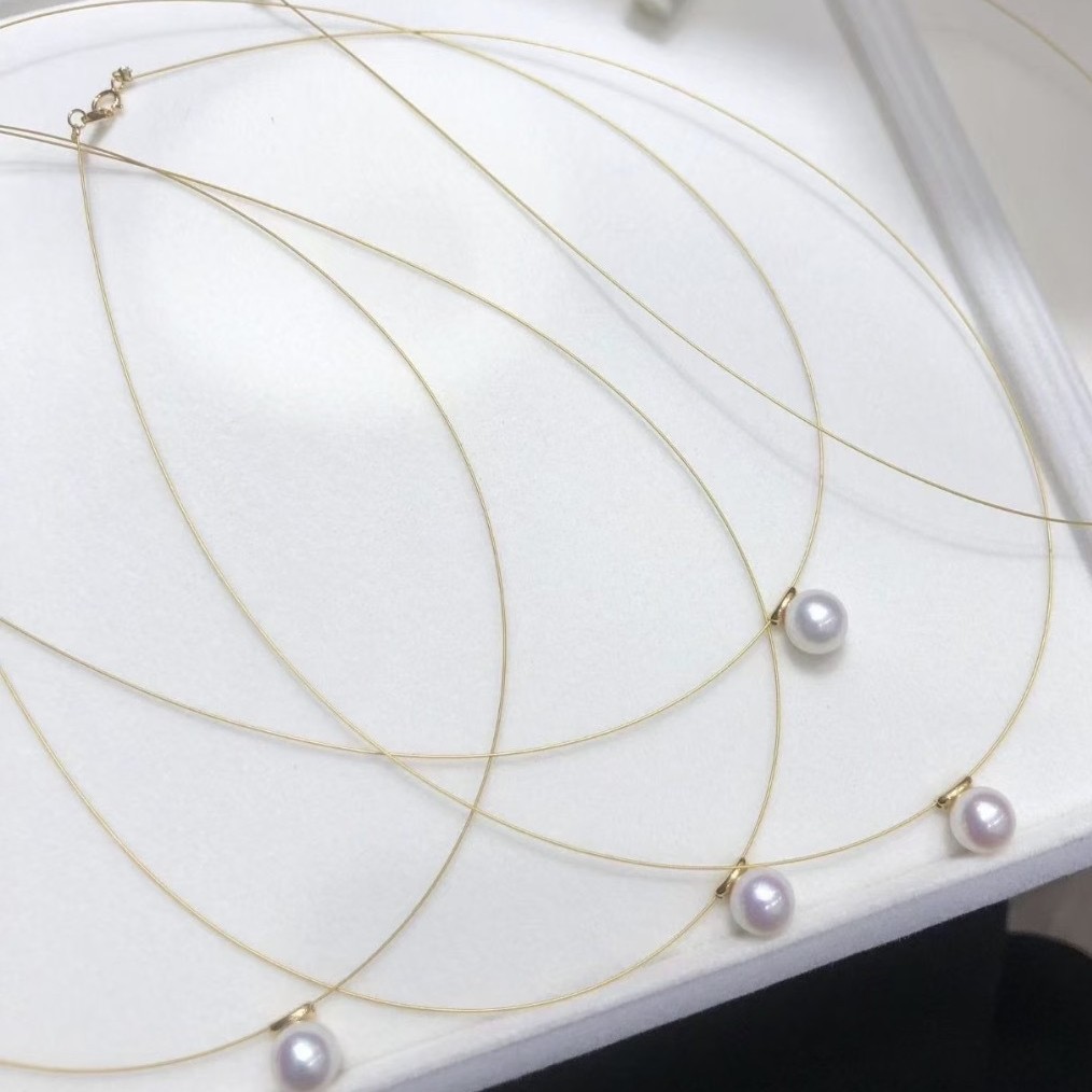 9-11mm Zhejiang natural freshwater pearl, perfectly round, extremely lustrous, with very minor imperfections, Edison round pearl pendant