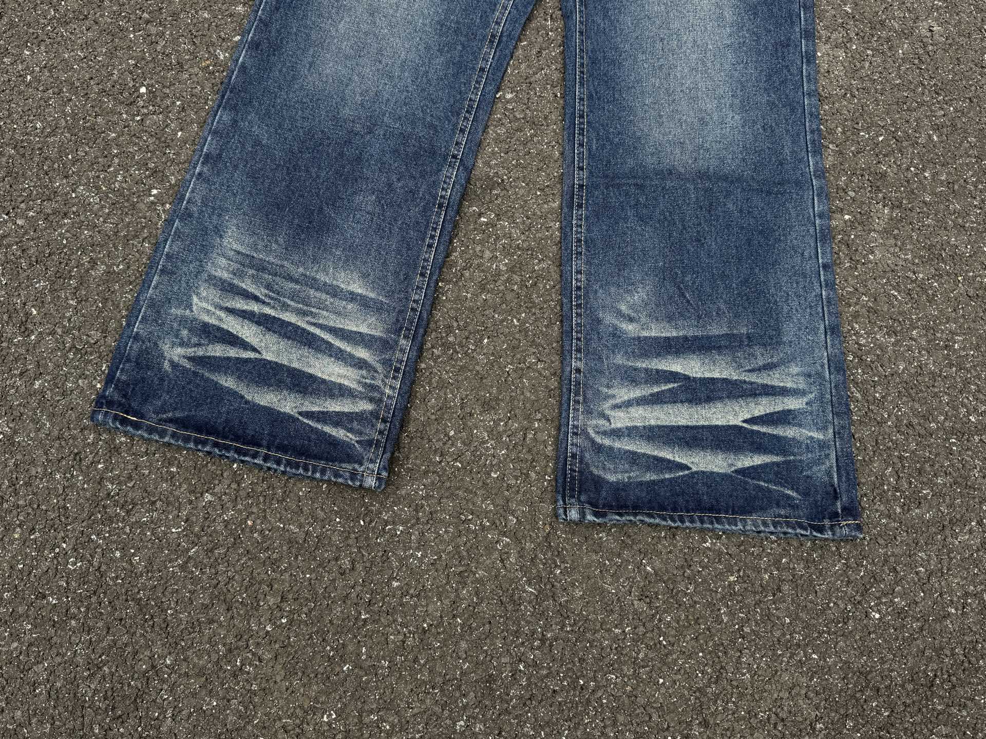 Style Oversized Washed Denim Pants – Baggy Streetwear Jeans With Ripple Effect & Distressed Detailing"_voghion.com