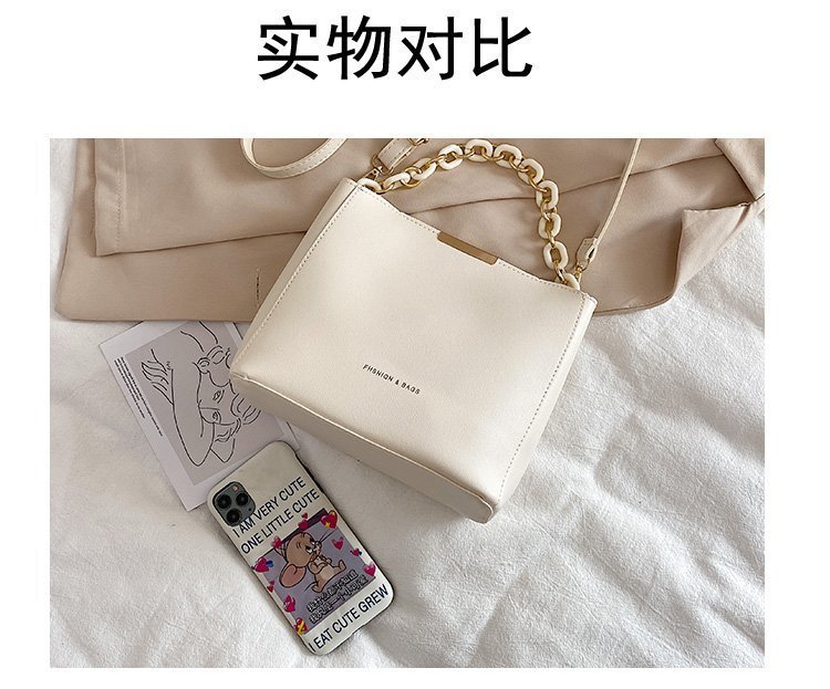 The 2022 new Korean-style women's bucket bag is a trendy spring and summer single-shoulder crossbody bag for young women. It's a cute and simple commuting bag for women details Picture