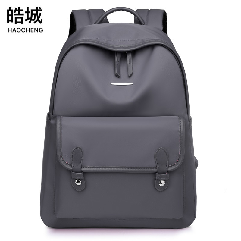 Fábrica al por mayor 2023 nueva mochila Oxford casual moda femenina todo fósforo gran capacidad computadora mochila de viaje