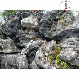 英石黑灰色图片 清远英石价格多少一吨 小区英石假山流水案例