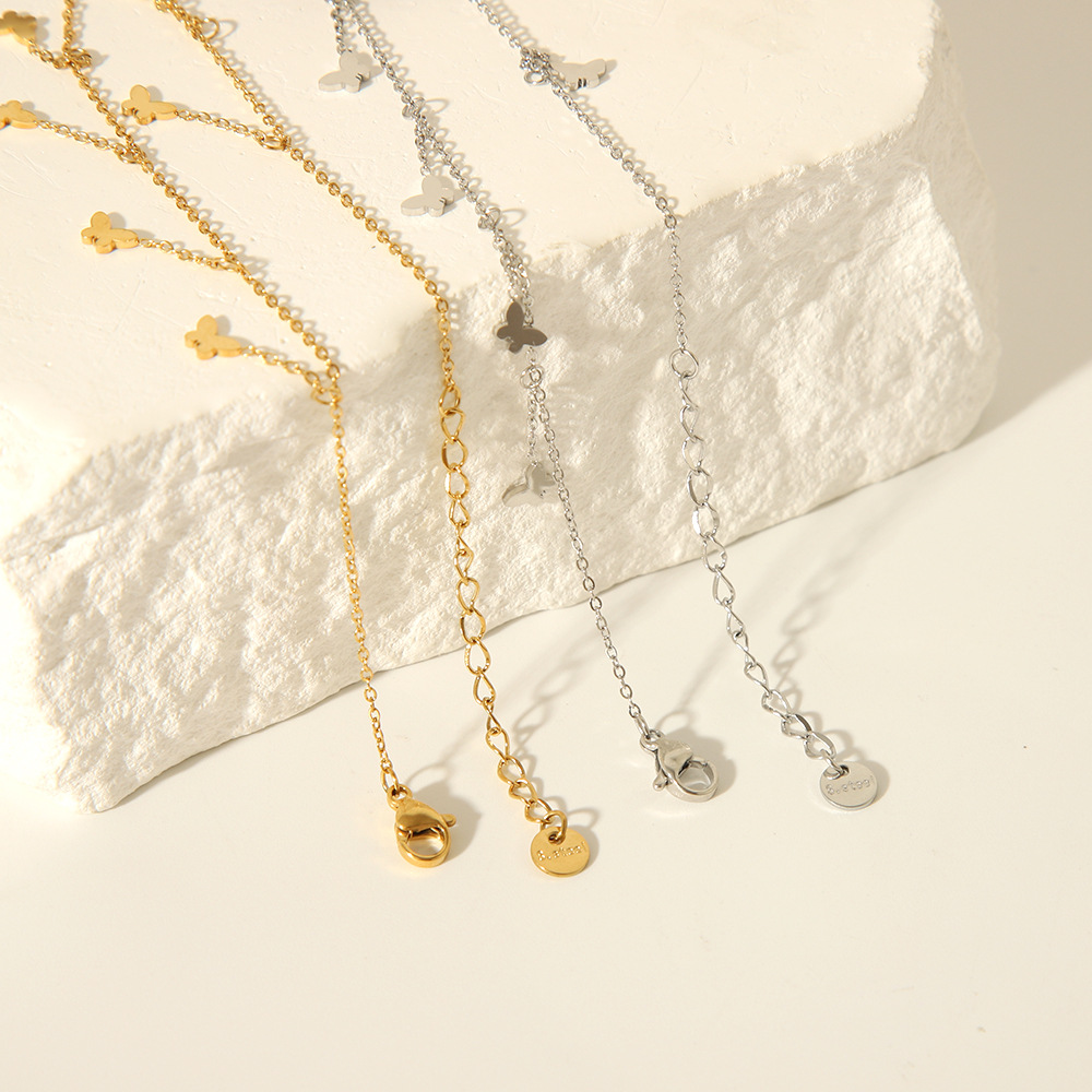 Estilo de alta gama europeo y americano acero inoxidable 18K accesorios de mariposa geométricos creativos tobillera de borla cadena de pie de viento simple INS femenino