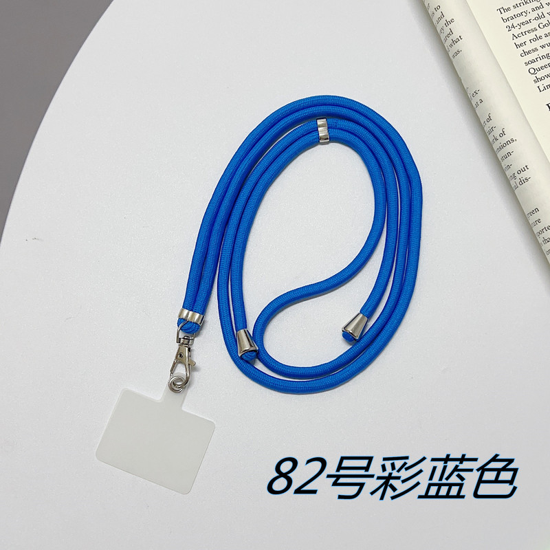 携帯ケースにナイロンのストラップが貼られています。|undefined